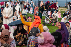 A woman takes a selfie at the Eid-Al-Adha celebration in Bensonhurst, Brooklyn, NY, on July 20, 2021. (Photo by Gabriele Holtermann)