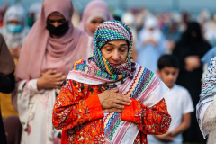 Members of the Islamic Society of Bay Ridge join in prayer at the Eid-Al-Adha celebration in Bensonhurst, Brooklyn, NY, on July 20, 2021. (Photo by Gabriele Holtermann)