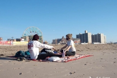 December 13,2020 Coney Island Polar Bear Club enjoys beautiful weather while people stroll the boardwalk and enjoy the sunny weather before the predicted snow storm to hit the East Coast on Wednesday.Alex and Ava