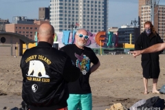 December 13,2020 Coney Island Polar Bear Club enjoys beautiful weather while people stroll the boardwalk and enjoy the sunny weather before the predicted snow storm to hit the East Coast on Wednesday.