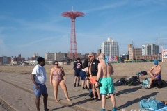 December 13,2020 Coney Island Polar Bear Club enjoys beautiful weather while people stroll the boardwalk and enjoy the sunny weather before the predicted snow storm to hit the East Coast on Wednesday.