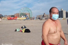 December 13,2020 Coney Island Polar Bear Club enjoys beautiful weather while people stroll the boardwalk and enjoy the sunny weather before the predicted snow storm to hit the East Coast on Wednesday.