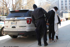 February 20, 2022  New York, 
Police Officers from the 1st precinct walk a suspect into the  Manhattan Criminal Courthouse for arraignment.