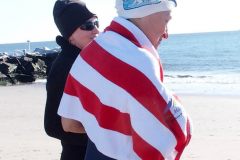 January 30, 2022 New York  
The day after a Nor'Easter hit New York City with 11 inches of snow the Coney Island Polar Bear Club  braved the cold 15 degree Fahrenheit temperature and jumped into the frigid Atlantic Ocean to have some fun.