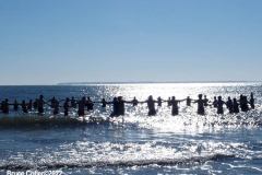 January 30, 2022 New York  
The day after a Nor'Easter hit New York City with 11 inches of snow the Coney Island Polar Bear Club  braved the cold 15 degree Fahrenheit temperature and jumped into the frigid Atlantic Ocean to have some fun.