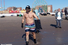January 30, 2022 New York  
The day after a Nor'Easter hit New York City with 11 inches of snow the Coney Island Polar Bear Club  braved the cold 15 degree Fahrenheit temperature and jumped into the frigid Atlantic Ocean to have some fun.