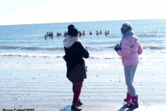 January 30, 2022 New York  
The day after a Nor'Easter hit New York City with 11 inches of snow the Coney Island Polar Bear Club  braved the cold 15 degree Fahrenheit temperature and jumped into the frigid Atlantic Ocean to have some fun.