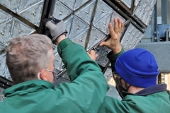 December 27 , 2020   New York City . Workers on roof of One Times Square prepare the New Years Eve Ball  by replacing crystals and checking the wiring for the big night