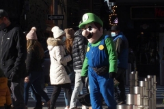December 27 , 2020    Tourist walk around times square enjoying the brisk weather