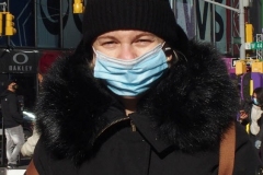 December 27 , 2020    Tourist walk around times square enjoying the brisk weather