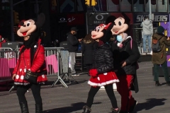December 27 , 2020    Tourist walk around times square enjoying the brisk weather