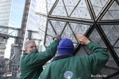 December 27 , 2020   New York City . Workers on roof of One Times Square prepare the New Years Eve Ball  by replacing crystals and checking the wiring for the big night