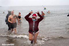 January 1, 2022  New York ,   Coney Island Polar Bear Plunge. This year the Polar Bear Plunge returned after last year's Covid  outbreak. Revelers enjoy the water.