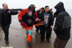 January 1, 2022  New York ,   Coney Island Polar Bear Plunge. This year the Polar Bear Plunge returned after last year's Covid  outbreak. Revelers enjoy the water.
Participant  prior to massive cardiac event and Emergency medical personnel try and revive him before transporting him to area hospital.