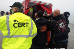 January 1, 2022  New York ,   Coney Island Polar Bear Plunge. This year the Polar Bear Plunge returned after last year's Covid  outbreak. Revelers enjoy the water.
Participant  prior to massive cardiac event and Emergency medical personnel try and revive him before transporting him to area hospital.