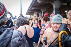 The Polar Bear Plunge commenced after a two year hiatus. An overcast and chilly day, spectators and participants took to the beach to keep on the ol’ tradition that kick starts many peoples’ year with a shock awakening of the senses. Brooklyn, NYC, NY. 01.01.22 (C) Bianca Otero