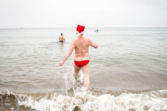 The Polar Bear Plunge commenced after a two year hiatus. An overcast and chilly day, spectators and participants took to the beach to keep on the ol’ tradition that kick starts many peoples’ year with a shock awakening of the senses. Brooklyn, NYC, NY. 01.01.22 (C) Bianca Otero
