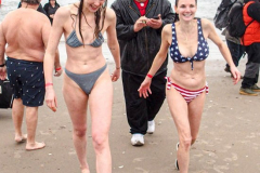 The Polar Bear Plunge commenced after a two year hiatus. An overcast and chilly day, spectators and participants took to the beach to keep on the ol’ tradition that kick starts many peoples’ year with a shock awakening of the senses. Brooklyn, NYC, NY. 01.01.22 (C) Bianca Otero