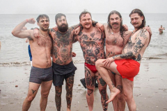 The Polar Bear Plunge commenced after a two year hiatus. An overcast and chilly day, spectators and participants took to the beach to keep on the ol’ tradition that kick starts many peoples’ year with a shock awakening of the senses. Brooklyn, NYC, NY. 01.01.22 (C) Bianca Otero