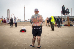 The Polar Bear Plunge commenced after a two year hiatus. An overcast and chilly day, spectators and participants took to the beach to keep on the ol’ tradition that kick starts many peoples’ year with a shock awakening of the senses. Brooklyn, NYC, NY. 01.01.22 (C) Bianca Otero