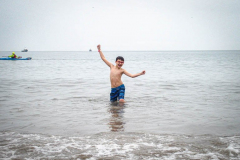 The Polar Bear Plunge commenced after a two year hiatus. An overcast and chilly day, spectators and participants took to the beach to keep on the ol’ tradition that kick starts many peoples’ year with a shock awakening of the senses. Brooklyn, NYC, NY. 01.01.22 (C) Bianca Otero