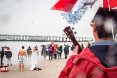 The Polar Bear Plunge commenced after a two year hiatus. An overcast and chilly day, spectators and participants took to the beach to keep on the ol’ tradition that kick starts many peoples’ year with a shock awakening of the senses. Brooklyn, NYC, NY. 01.01.22 (C) Bianca Otero
