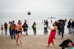 The Polar Bear Plunge commenced after a two year hiatus. An overcast and chilly day, spectators and participants took to the beach to keep on the ol’ tradition that kick starts many peoples’ year with a shock awakening of the senses. Brooklyn, NYC, NY. 01.01.22 (C) Bianca Otero