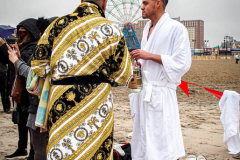The Polar Bear Plunge commenced after a two year hiatus. An overcast and chilly day, spectators and participants took to the beach to keep on the ol’ tradition that kick starts many peoples’ year with a shock awakening of the senses. Brooklyn, NYC, NY. 01.01.22 (C) Bianca Otero