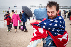 The Polar Bear Plunge commenced after a two year hiatus. An overcast and chilly day, spectators and participants took to the beach to keep on the ol’ tradition that kick starts many peoples’ year with a shock awakening of the senses. Brooklyn, NYC, NY. 01.01.22 (C) Bianca Otero