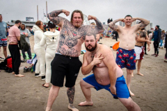 The Polar Bear Plunge commenced after a two year hiatus. An overcast and chilly day, spectators and participants took to the beach to keep on the ol’ tradition that kick starts many peoples’ year with a shock awakening of the senses. Brooklyn, NYC, NY. 01.01.22 (C) Bianca Otero