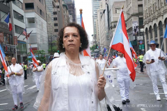 Carmen V. Cruz, founder of Silent Procession/NYC4PR marches down 5th Avenue during the 65 National Puerto Rican Day Parade is celebrated by thousands who marched and cheered on along 5th avenue in Manhattan New York on Sunday, June 12, 2022 The 2022 Parade was dedicated to the municipality of Cidra, Puerto Rico. Known as the Pueblo de la Eterna Primavera (Town of Eternal Spring), Cidra is located in the central, mountainous region of the island.

Photography by Enid B. Alvarez