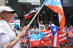 Silent Procession/NYC4PR marches down 5th Avenue during the 65 National Puerto Rican Day Parade is celebrated by thousands who marched and cheered on along 5th avenue in Manhattan New York on Sunday, June 12, 2022 The 2022 Parade was dedicated to the municipality of Cidra, Puerto Rico. Known as the Pueblo de la Eterna Primavera (Town of Eternal Spring), Cidra is located in the central, mountainous region of the island.

Photography by Enid B. Alvarez