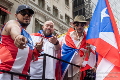 Puerto Rican Rapper Bda Bunny (R) attends the Puerto Rican Day Parade along  5th Avenue in New York, New York on June 12,  2022.  (Photo by Gabriele Holtermann/Sipa USA)
