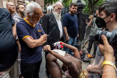Performance artist Crackhead Barney challenges pro-life supporters outside Old St. Pat's Basilica on July 2, 2022, in New York, NY. (Photo by Gabriele Holtermann/Sipa USA)