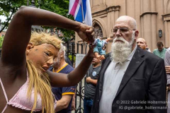 Performance artist Crackhead Barney challenges pro-life supporters outside Old St. Pat's Basilica on July 2, 2022, in New York, NY. (Photo by Gabriele Holtermann/Sipa USA)