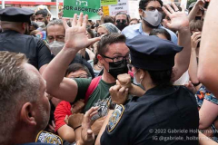 NYPD officers try to clear the way for a pro-life procession to Planned Parenthood  as pro-abortion protestors push back on July 2, 2022, in New York, NY. (Video by Gabriele Holtermann/Sipa USA)