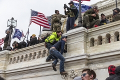 Washington, DC - January 6, 2021: Pro-Trump protesters seen on and around Capitol building