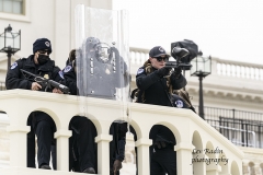 Washington, DC - January 6, 2021: Police seen preparing to shoot pepper-spray ball gun against pro-Trump protesters as they try to enter the Capitol building