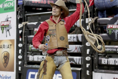 Chase Dougherty celebrates after riding a bull named Patillo Ridge while competing in the Professional Bull Riders (PBR) Unleash The Beast Monster Energy Buckoff at the Garden inside Madison Square Garden in New York City on January 8, 2022. (Photo by Andrew Schwartz)