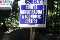 Member of the Professional Staff Congress the  college union that represents professors and college staff, protest in front of New York's City Hall.