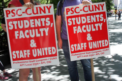 Member of the Professional Staff Congress the  college union that represents professors and college staff, protest in front of New York's City Hall.