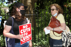 Member of the Professional Staff Congress the  college union that represents professors and college staff, protest in front of New York's City Hall.