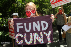 Member of the Professional Staff Congress the  college union that represents professors and college staff, protest in front of New York's City Hall.