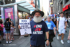 New York,Assembly Members Daniel Rosenthal and Simcha Eichenstein hold a protest to #EndJewHatred at Ben & Jerry’s, and to oppose antisemitic and illegal commercial boycotts against Jews and Israel. Ben & Jerry’s at 200 W. 44th Street, Manhattan. HeshyTischler  stirs up the crowd. and a counter protest backing Ben & Jerry's was held across the street from the anti Ben & Jerry's protest