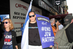 New York,Assembly Members Daniel Rosenthal and Simcha Eichenstein hold a protest to #EndJewHatred at Ben & Jerry’s, and to oppose antisemitic and illegal commercial boycotts against Jews and Israel. Ben & Jerry’s at 200 W. 44th Street, Manhattan. HeshyTischler  stirs up the crowd. and a counter protest backing Ben & Jerry's was held across the street from the anti Ben & Jerry's protest