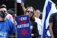 New York,Assembly Members Daniel Rosenthal and Simcha Eichenstein hold a protest to #EndJewHatred at Ben & Jerry’s, and to oppose antisemitic and illegal commercial boycotts against Jews and Israel. Ben & Jerry’s at 200 W. 44th Street, Manhattan. HeshyTischler  stirs up the crowd. and a counter protest backing Ben & Jerry's was held across the street from the anti Ben & Jerry's protest