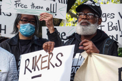 Demonstrators during a protest against Rikers Island Prison and facilities in front of City Hall, NYC, October 1, 2021.
On September 22, 2021 the death of Stephan Khadu, 24, just a few days after Abdul Karim, became the 12th inmate to die at Rikers Island Prison in 2021. After various inquiries and investigations, activist groups such as:  Women Prison Coalition, HALT Solitary Confinement, Vocal New York and Jails Action Coalition  organized the protest to gather former inmates, family and supporters together, to demand answers from local authorities and political figures regarding the system of prison management, process of bail and incarceration of people who inevitably find themselves in prison without a conviction. 
The protest moved from City Hall onto a Broadway intersection and blocked traffic up to a half a mile long for almost an hour. 
(C) Bianca Otero, October 1, 2021