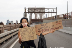 New York,  12,000 N.Y.C.  Municipal employees (police,fire,sanitation,teachers) protest  the  
Mandate to get vaccinated by October 29, 2021 or be put on unpaid leave. The protesters walked across the Brooklyn Bridge to City Hall.