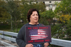 New York,  12,000 N.Y.C.  Municipal employees (police,fire,sanitation,teachers) protest  the  
Mandate to get vaccinated by October 29, 2021 or be put on unpaid leave. The protesters walked across the Brooklyn Bridge to City Hall.