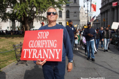 New York,  12,000 N.Y.C.  Municipal employees (police,fire,sanitation,teachers) protest  the  
Mandate to get vaccinated by October 29, 2021 or be put on unpaid leave. The protesters walked across the Brooklyn Bridge to City Hall.
